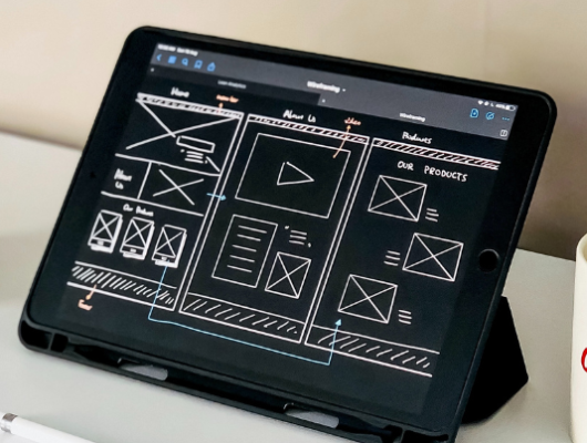 web design wireframe on tablet