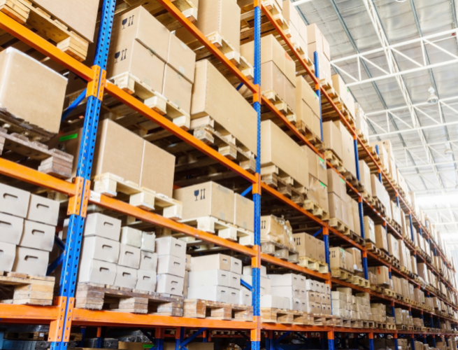 shelves of boxes in wholesale distribution setting