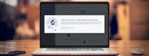 laptop on table with popup banner about upgrading to BigCommerce Products v3