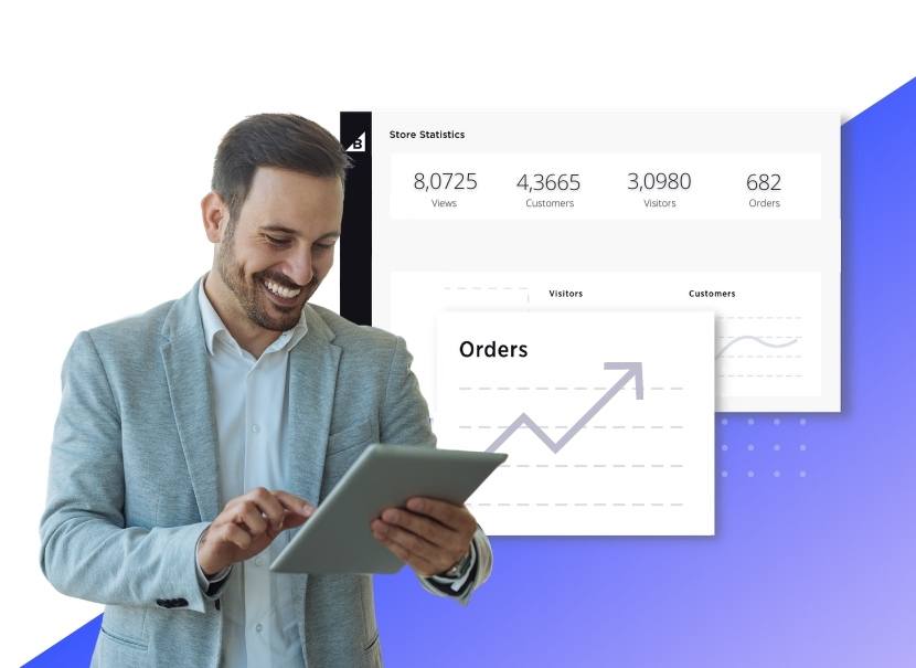 man in suit jacket smiling looking at tablet with Bigcommerce order dashboard in background