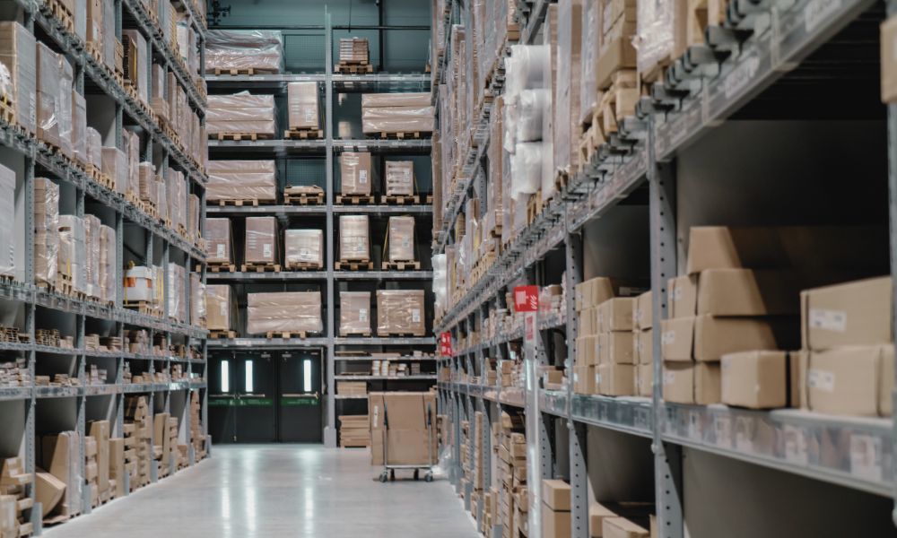 Industrial warehouse with boxes on shelves