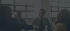 Business man, handshake and deal in a meeting with agreement and contract collaboration. Partnership, success and b2b work with shaking hands to welcome and show congratulations from teamwork.