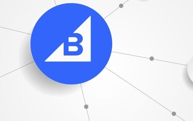 A blue circle with the uppercase letter B in the center, surrounded by multiple white circles on a white background